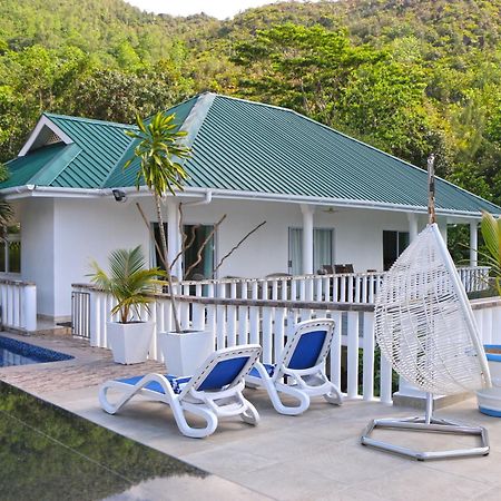Ocean Blue Bay Anse Volbert Village Exterior foto