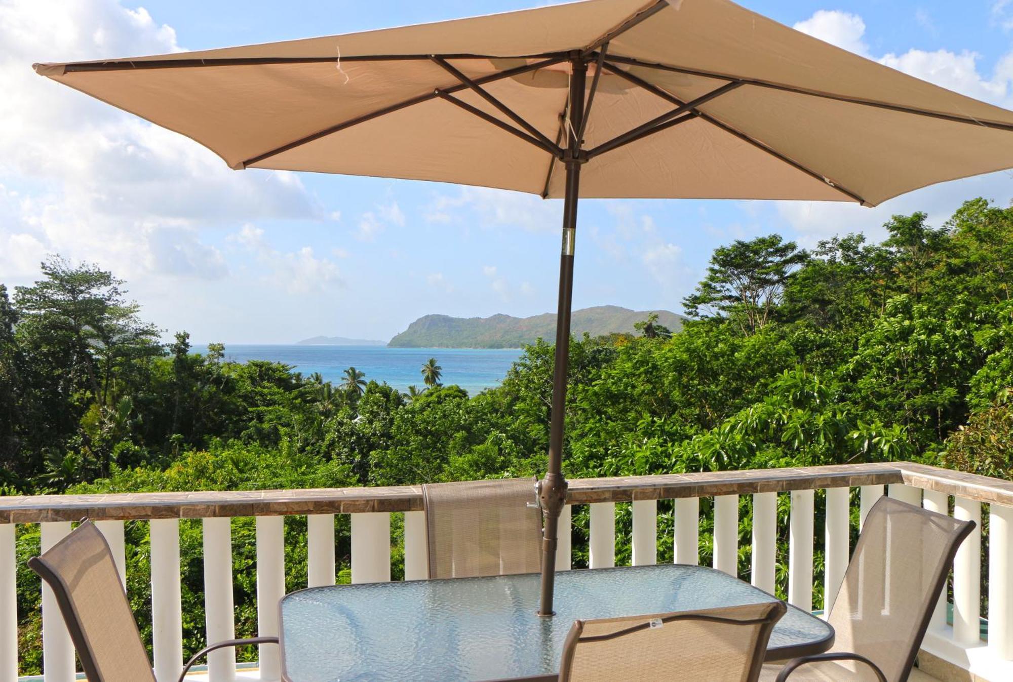 Ocean Blue Bay Anse Volbert Village Exterior foto