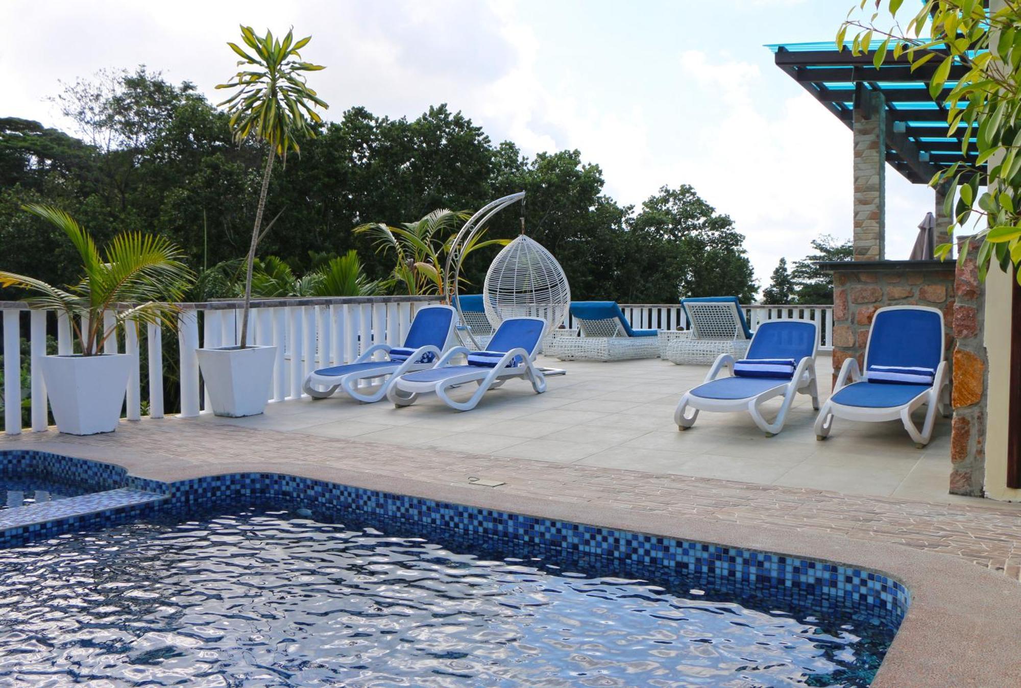 Ocean Blue Bay Anse Volbert Village Exterior foto