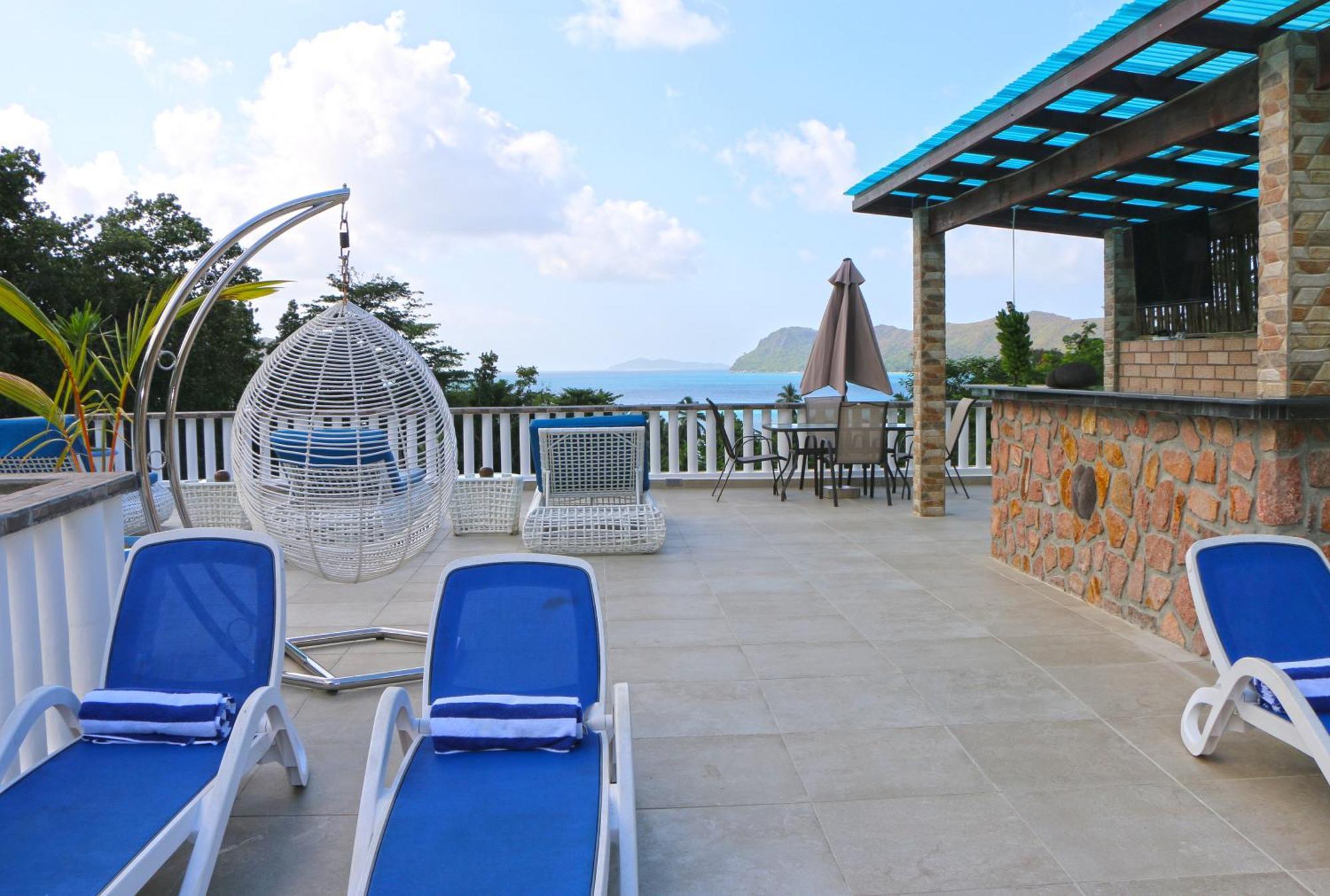 Ocean Blue Bay Anse Volbert Village Exterior foto