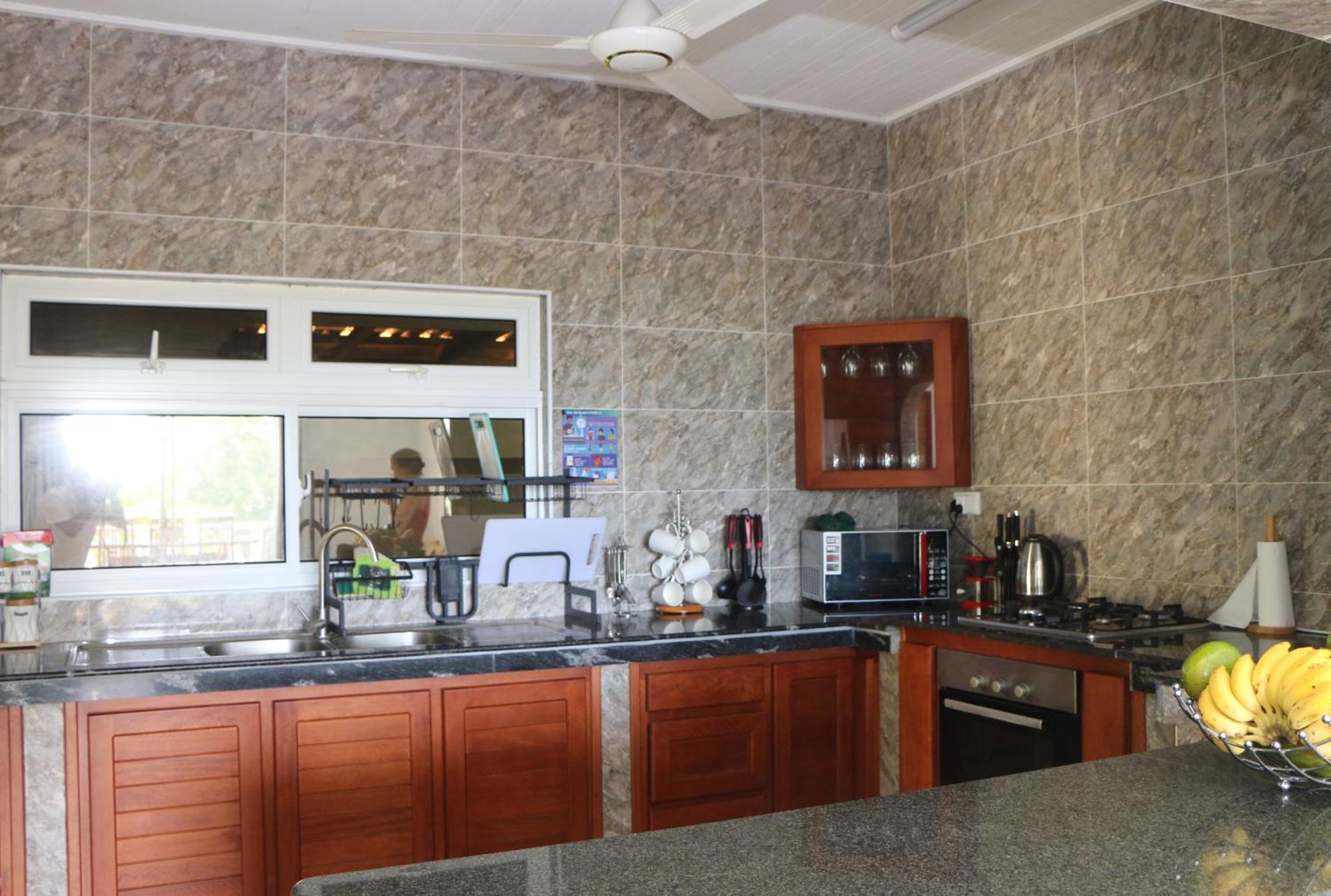 Ocean Blue Bay Anse Volbert Village Exterior foto