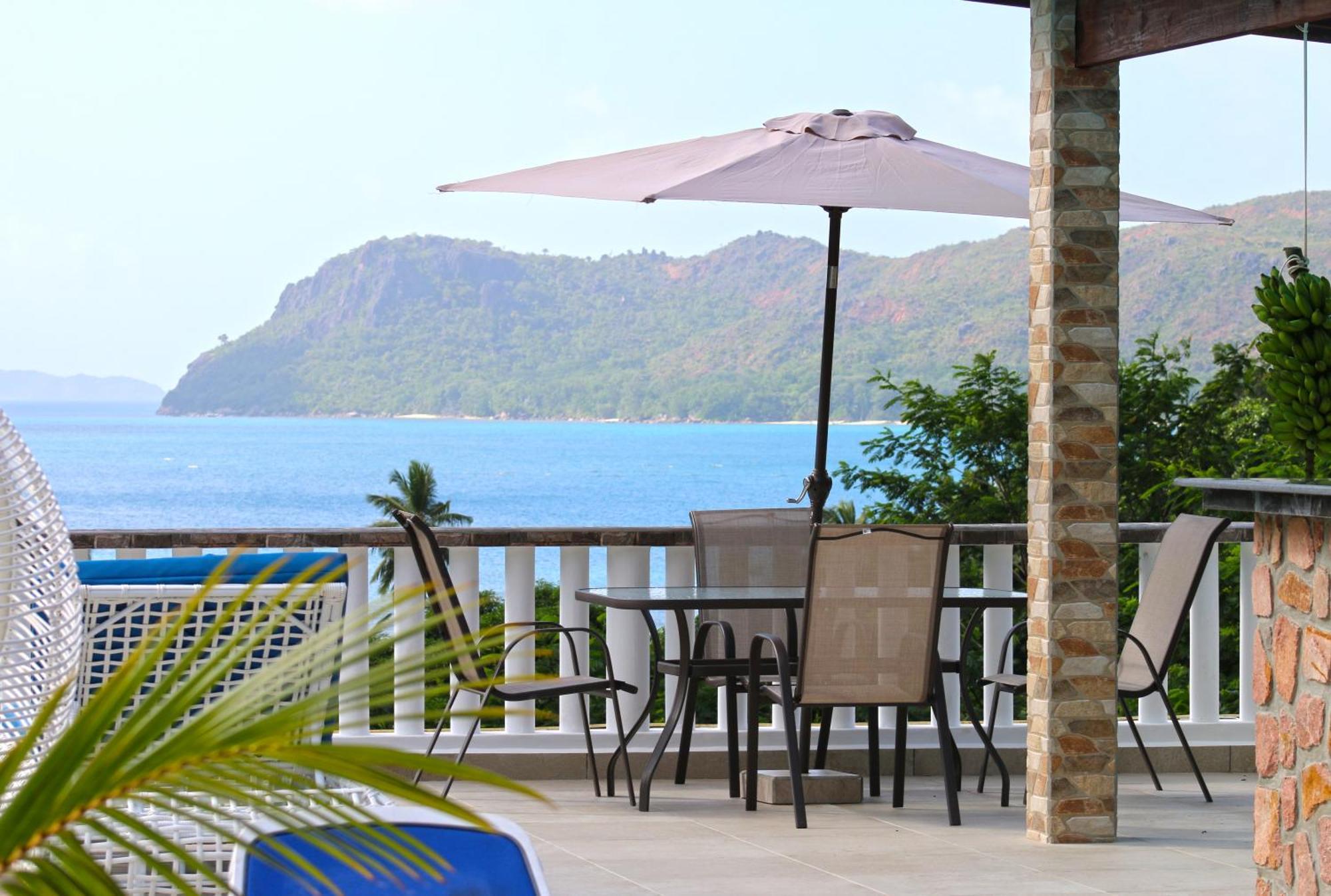 Ocean Blue Bay Anse Volbert Village Exterior foto