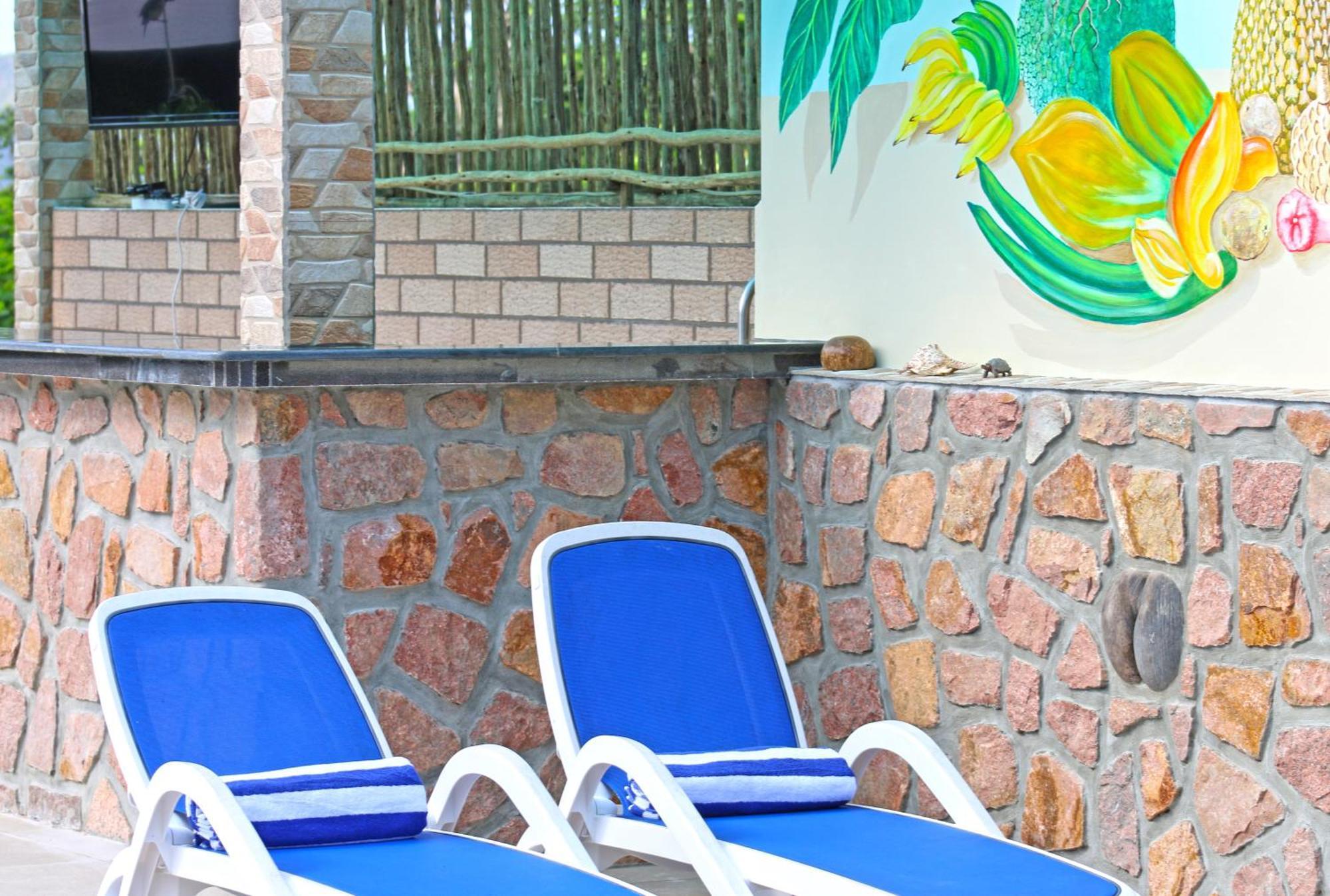 Ocean Blue Bay Anse Volbert Village Exterior foto